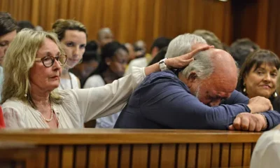 Steenkamp's parents in distress during a court hearing.